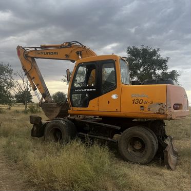 Колёсный экскаватор Hyundai R130W-3, 2003